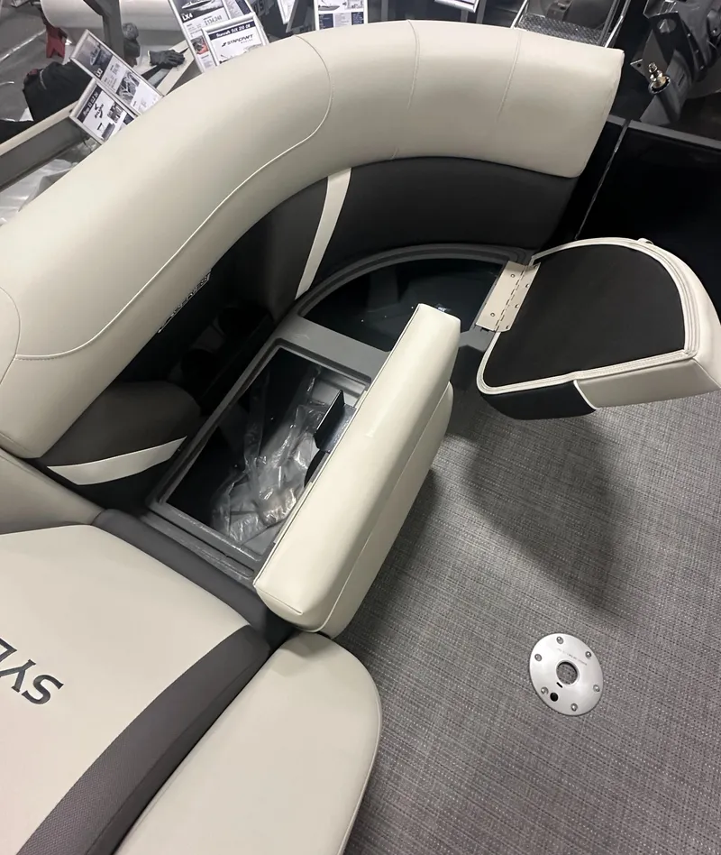 Slide: The Image of 2025 Sylvan Mirage X3 CLZ DH boat interior with gray seating. - 20