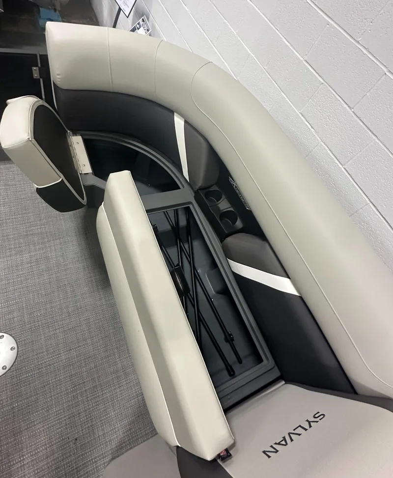 Slide: The Image of 2025 Sylvan Mirage X3 CLZ DH boat seating, featuring sleek beige and gray upholstery. - 22