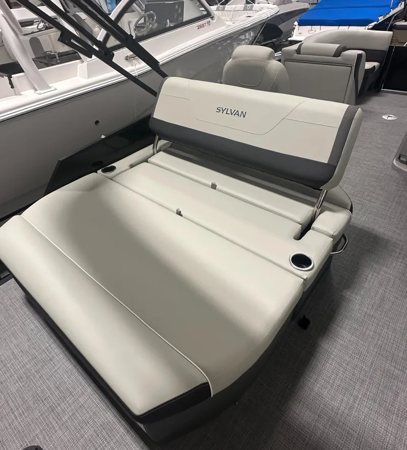Slide: The Image of 2025 Sylvan Mirage X3 CLZ DH pontoon boat interior with spacious seating and modern design. - 7