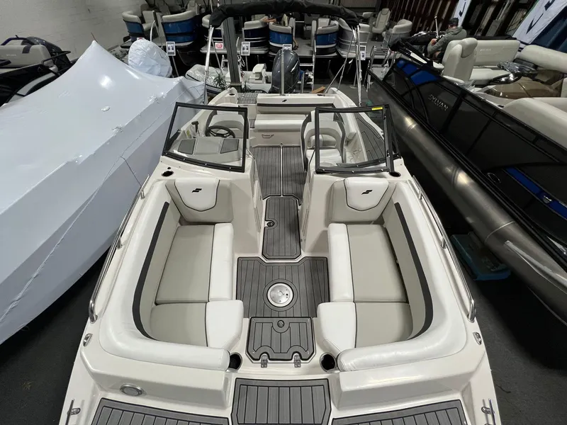 Slide: The Image of 2024 Starcraft SVX 210 OB boat interior with spacious seating and modern design. - 10