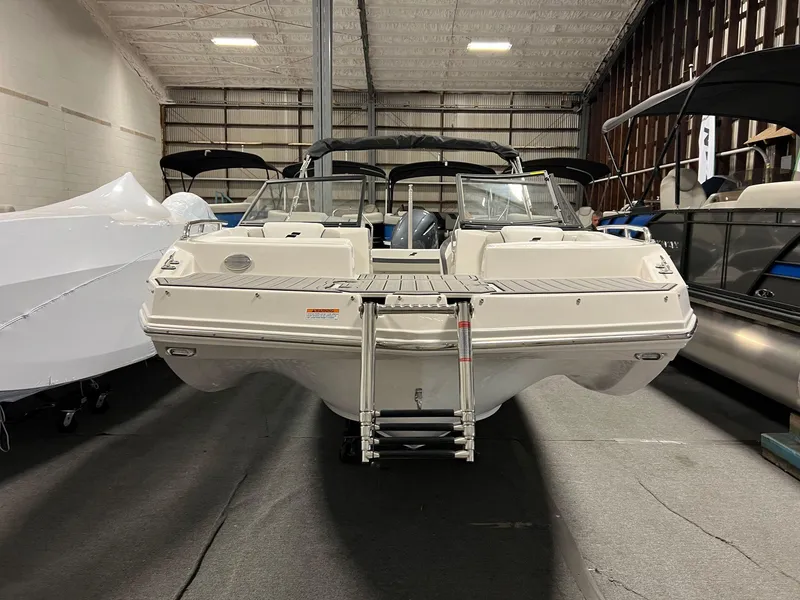 Slide: The Image of 2024 Starcraft SVX 210 OB boat in indoor storage facility. - 3