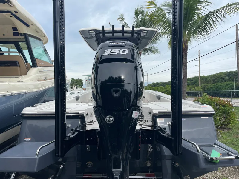 Slide: The Image of 2023 Robalo 266 Cayman boat with a 350 horsepower engine. - 2