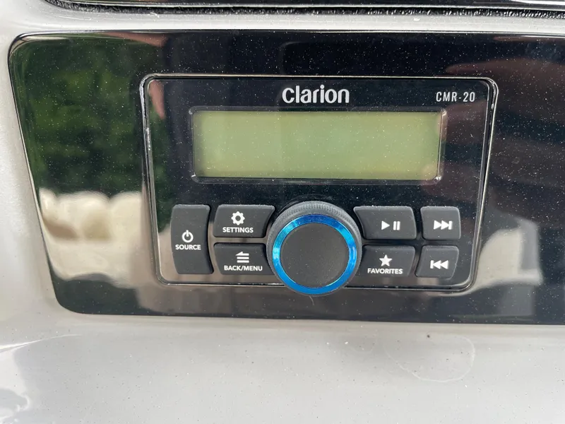 Slide: The Image of Clarion CMR-20 audio system on 2023 Robalo 266 Cayman boat. - 25