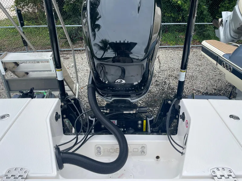 Slide: The Image of 2023 Robalo 266 Cayman boat engine and stern view. - 28