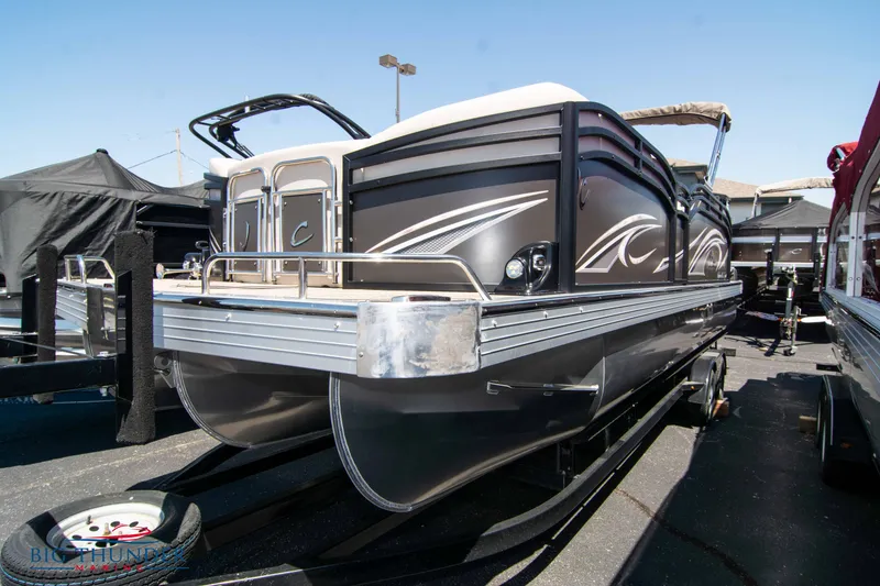 Slide: The Image of 2022 JC SunLounger 25 TT Sport pontoon boat on display. - 0