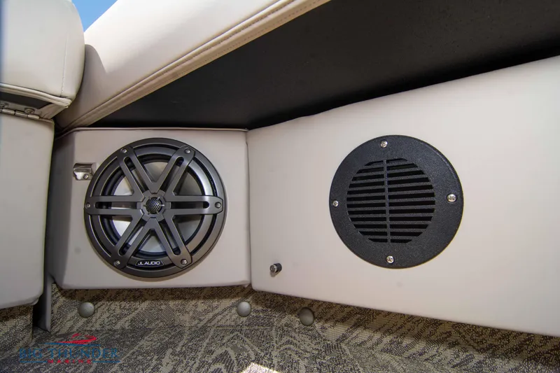 Slide: The Image of 2022 JC SunLounger 25 TT Sport boat interior speakers and upholstery. - 16