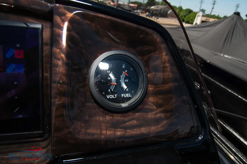 Slide: The Image of Dashboard of 2022 JC SunLounger 25 TT Sport showing volt and fuel gauges. - 23
