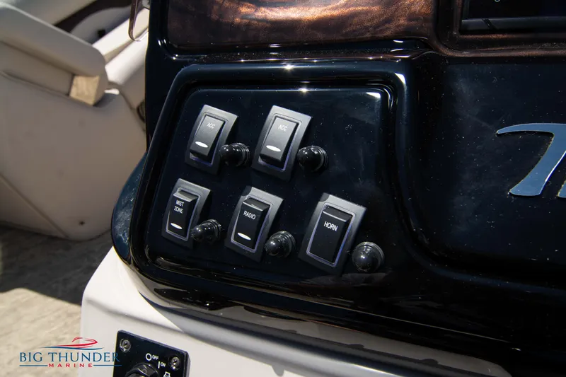 Slide: The Image of Control panel of a 2022 JC SunLounger 25 TT Sport boat. - 24