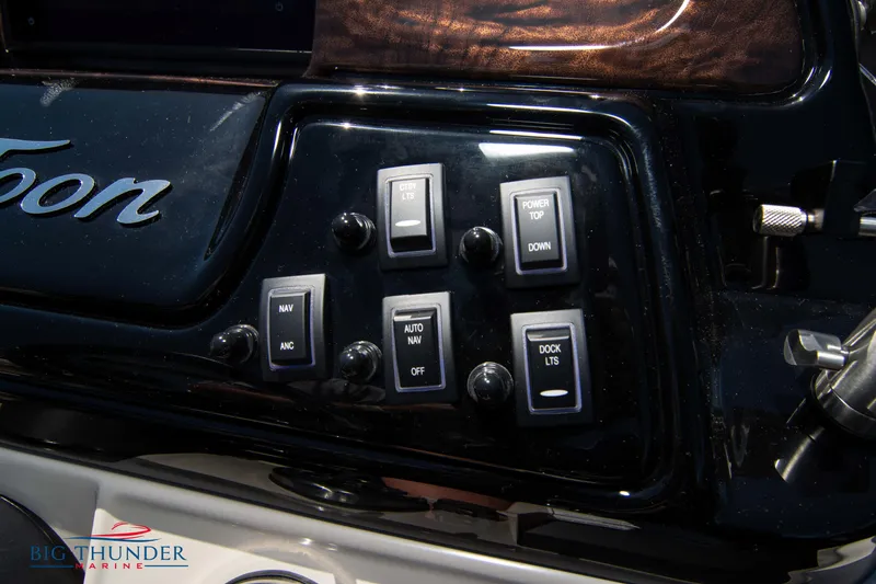 Slide: The Image of Control panel of a 2022 JC SunLounger 25 TT Sport boat. - 25