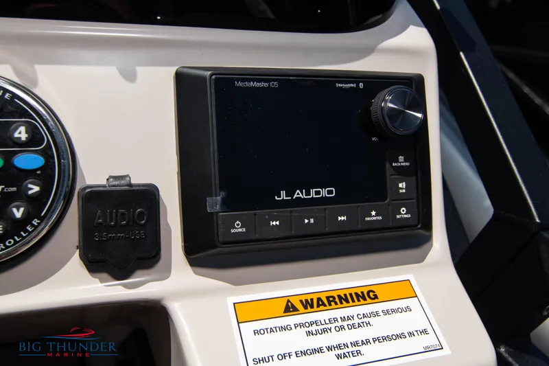 Slide: The Image of Control panel of a 2022 JC SunLounger 25 TT Sport boat with JL Audio system. - 27