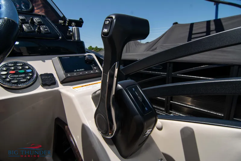 Slide: The Image of Control panel of 2022 JC SunLounger 25 TT Sport boat with throttle lever. - 29