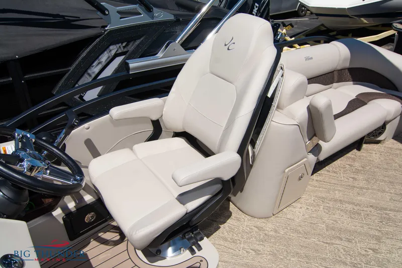 Slide: The Image of Luxurious seating on the 2022 JC SunLounger 25 TT Sport boat. - 32