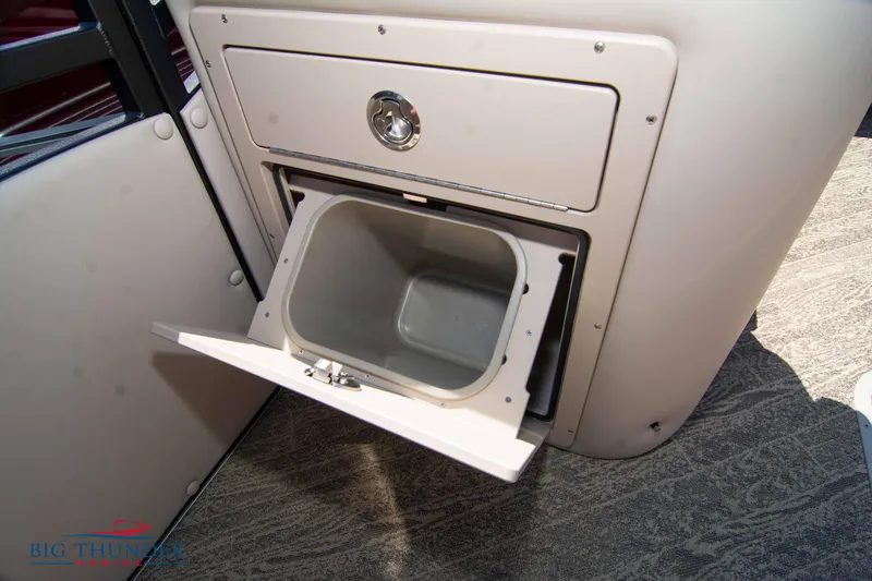 Slide: The Image of 2022 JC SunLounger 25 TT Sport storage compartment with open bin. - 37