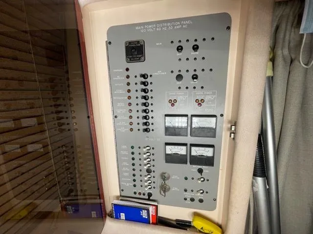 Slide: The Image of Main power distribution panel on a 1989 Sea Ray 300 Sedan Bridge boat. - 24