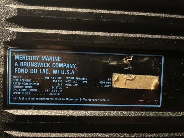 Slide: The Image of Mercury Marine engine specifications label on 1989 Sea Ray 300 Sedan Bridge. - 25