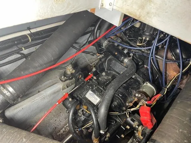 Slide: The Image of Engine compartment of a 1989 Sea Ray 300 Sedan Bridge boat. - 26