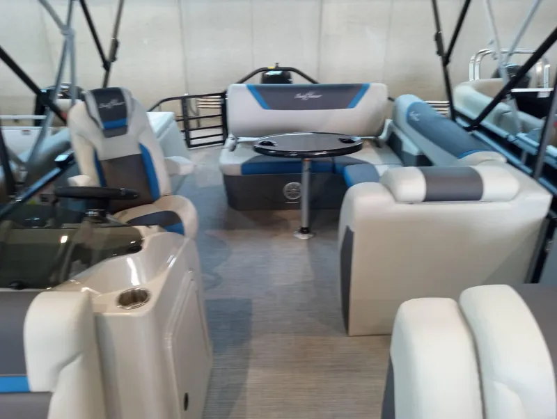 Slide: The Image of 2023 SunChaser Geneva Sport 23 SB interior with seating and table. - 5