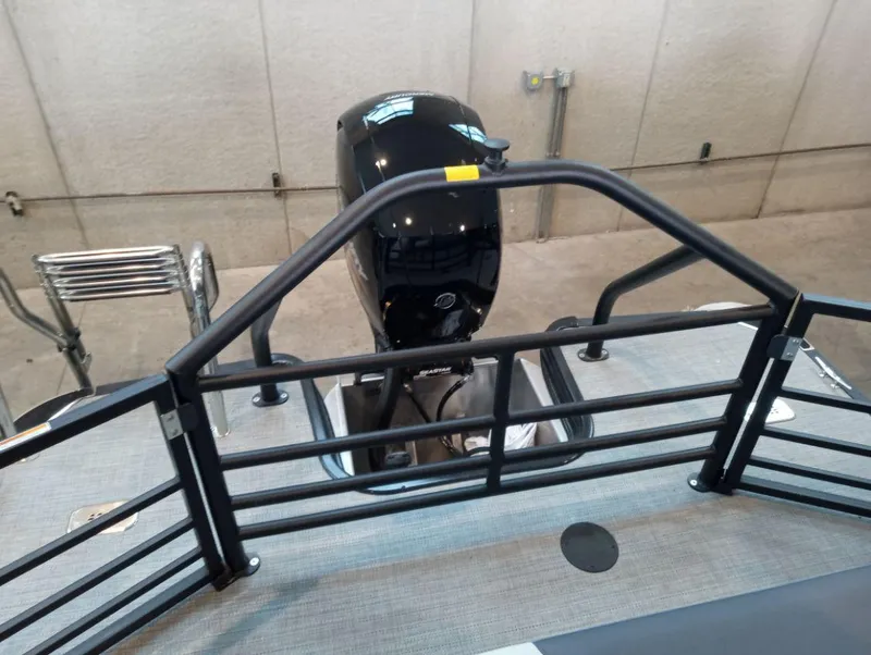 Slide: The Image of 2023 SunChaser Geneva Sport 23 SB pontoon boat rear view with outboard motor. - 8
