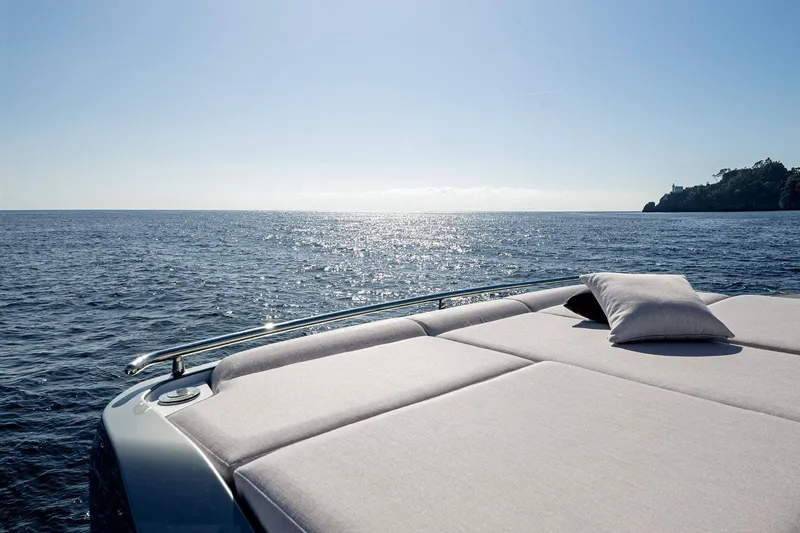 Slide: The Image of Luxurious 2022 Azimut S8 yacht deck overlooking serene ocean view. - 12