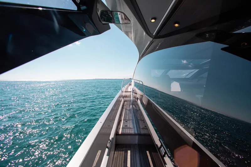 Slide: The Image of 2022 Azimut S8 yacht deck with ocean view and sleek design. - 18