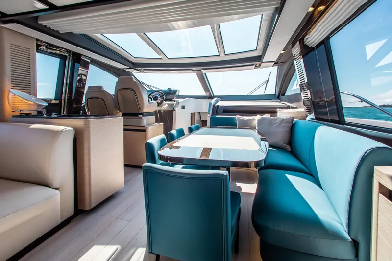 Slide: The Image of Luxurious interior of 2022 Azimut S8 yacht with modern seating and panoramic windows. - 27