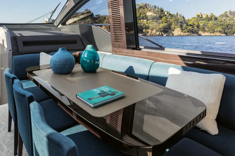 Slide: The Image of Luxurious interior of 2022 Azimut S8 yacht with elegant table and decorative vases. - 28