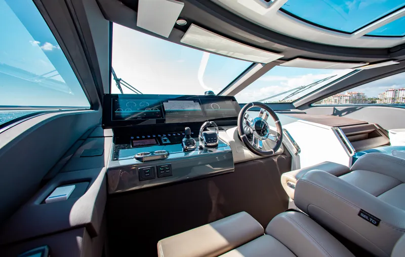 Slide: The Image of Luxurious 2022 Azimut S8 yacht cockpit with modern controls and panoramic views. - 29
