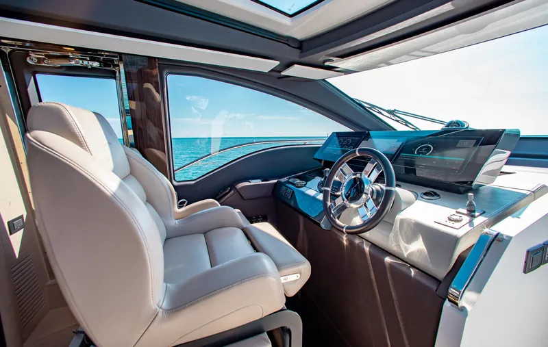 Slide: The Image of Luxurious 2022 Azimut S8 yacht cockpit with modern steering and ocean view. - 31
