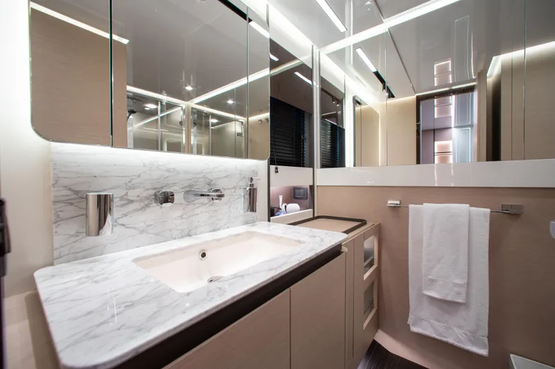 Slide: The Image of Luxurious bathroom in 2022 Azimut S8 yacht with marble countertop and modern fixtures. - 38