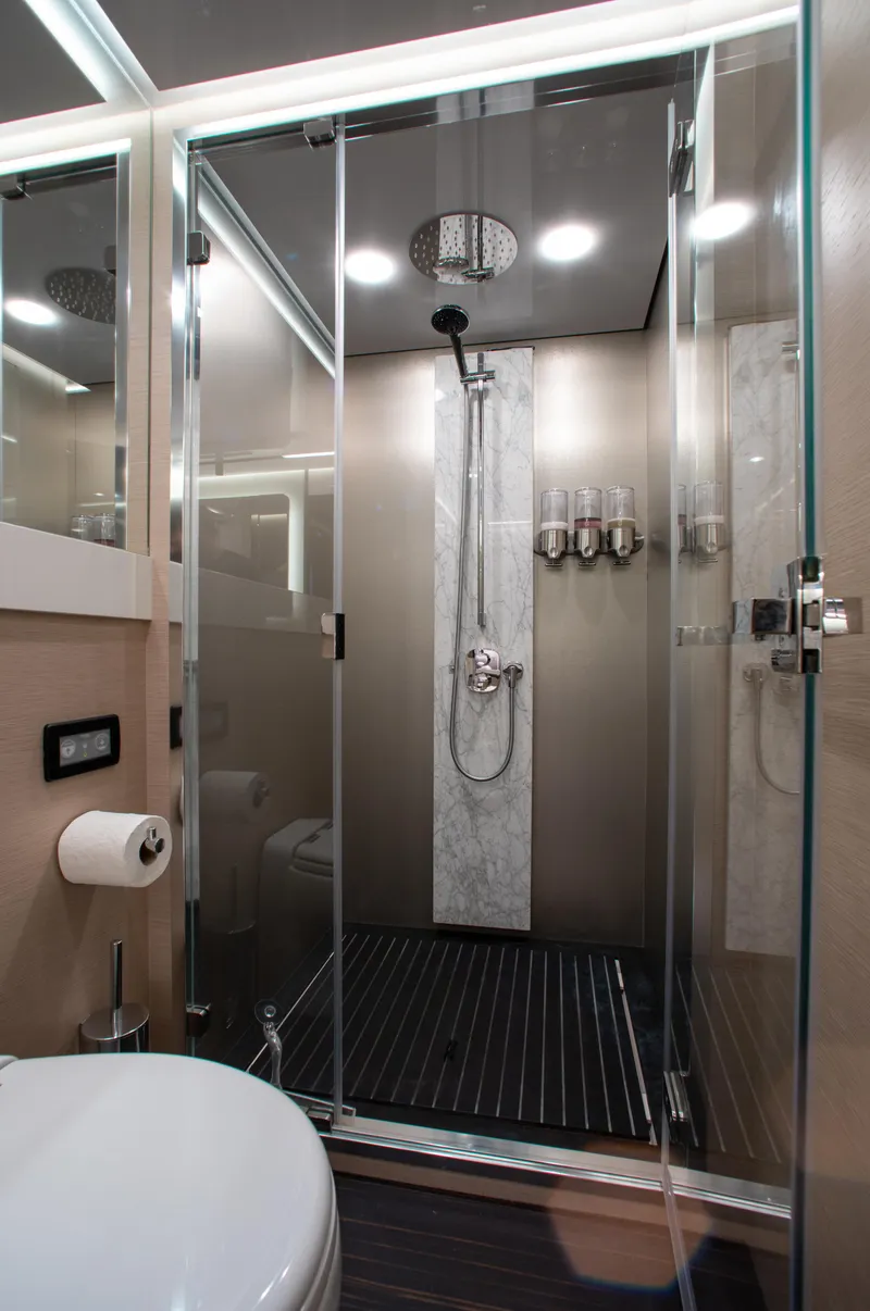 Slide: The Image of Luxurious bathroom in 2022 Azimut S8 yacht with modern shower and sleek design. - 39