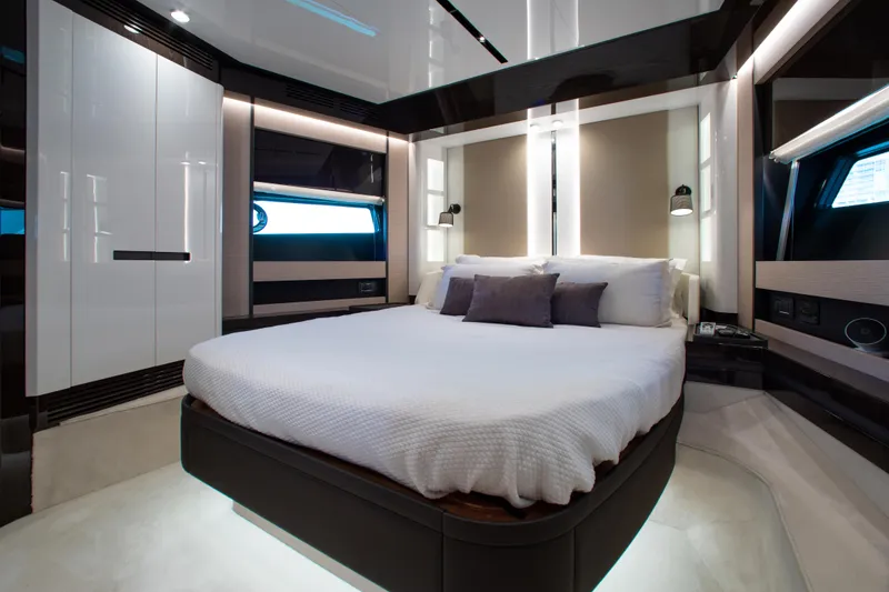 Slide: The Image of Luxurious bedroom interior of 2022 Azimut S8 yacht with modern design and elegant furnishings. - 40