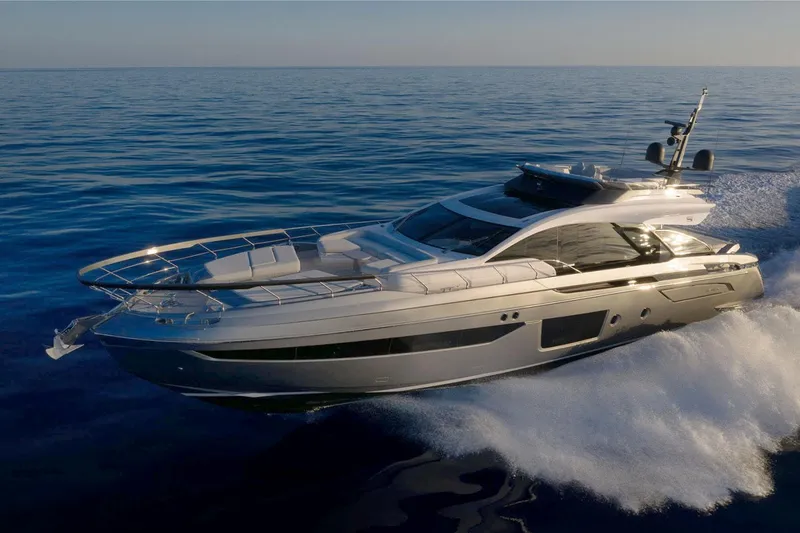 Slide: The Image of 2022 Azimut S8 yacht cruising on open sea, showcasing sleek design and luxury features. - 5