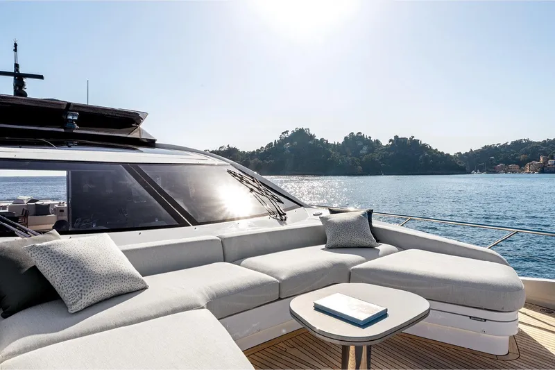 Slide: The Image of Luxurious 2022 Azimut S8 yacht with elegant deck seating and scenic ocean view. - 9