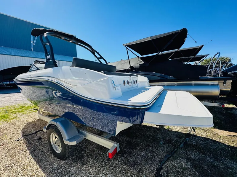 Slide: The Image of 2023 Bayliner DX 2050 boat on trailer, rear view. - 4