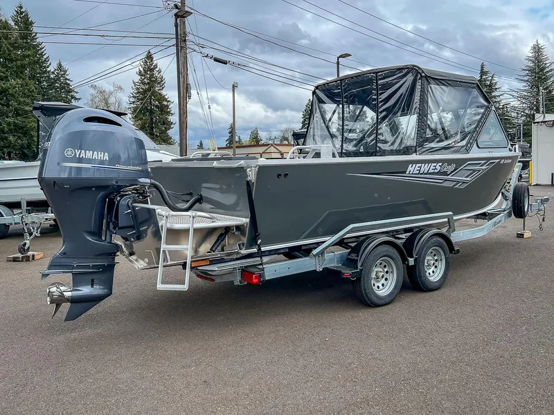 Slide: The Image of 2023 Hewescraft 210 Sea Runner ET boat with Yamaha outboard motor on trailer. - 3