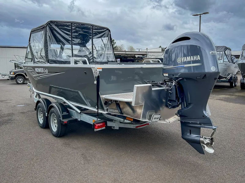 Slide: The Image of 2023 Hewescraft 210 Sea Runner ET with Yamaha outboard motor on trailer. - 5