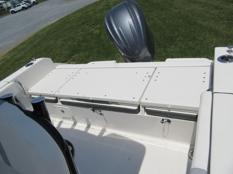 Slide: The Image of 2023 Robalo R230 Center Console boat with outboard motor. - 15