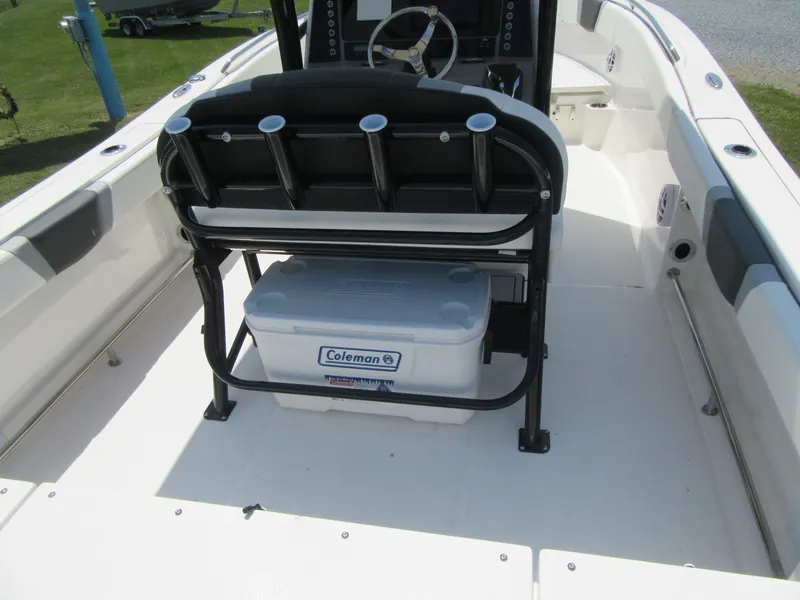 Slide: The Image of 2023 Robalo R230 Center Console boat interior with Coleman cooler. - 19