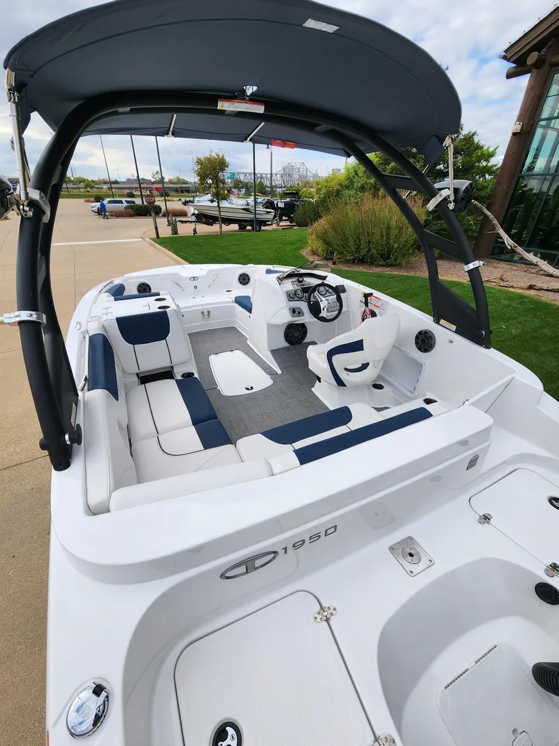 Slide: The Image of 2023 Tahoe 1950 boat with sleek design and spacious seating. - 3