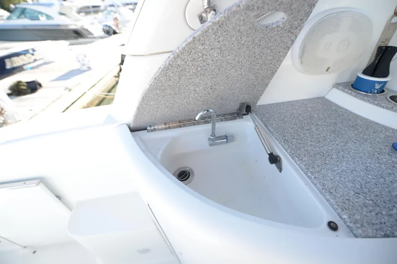 Slide: The Image of 2007 Formula 34 PC boat sink area with faucet and countertop. - 29