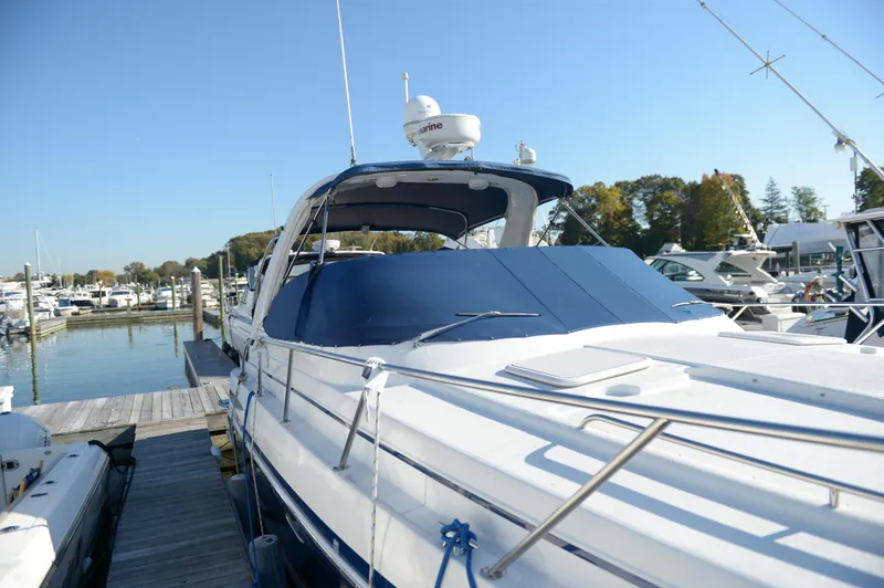 Slide: The Image of 2007 Formula 34 PC yacht docked at marina under clear blue sky. - 4