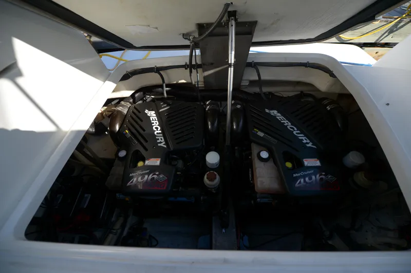 Slide: The Image of Twin Mercury engines in a 2007 Formula 34 PC boat engine compartment. - 40