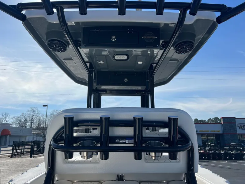 Slide: The Image of 2023 Blue Wave 2600 Makaira boat with T-top and rod holders. - 6