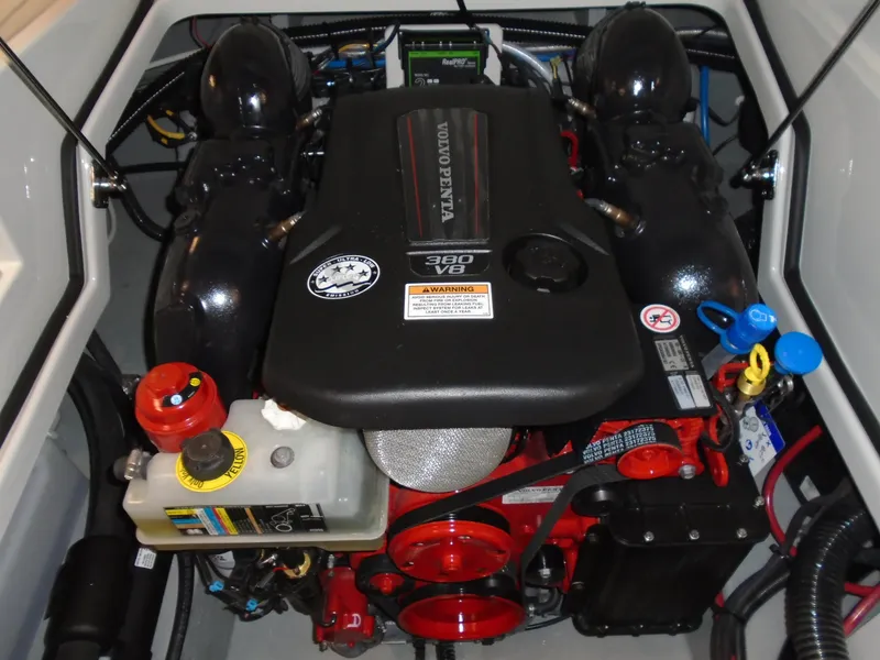 Slide: The Image of 2022 Crownline 240 SS boat engine compartment with Volvo Penta 300 V8 engine. - 10