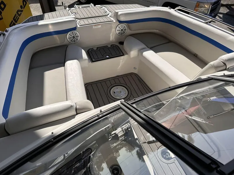 Slide: The Image of 2023 Starcraft SVX OB 210 OB DC boat interior with spacious seating and modern design. - 6