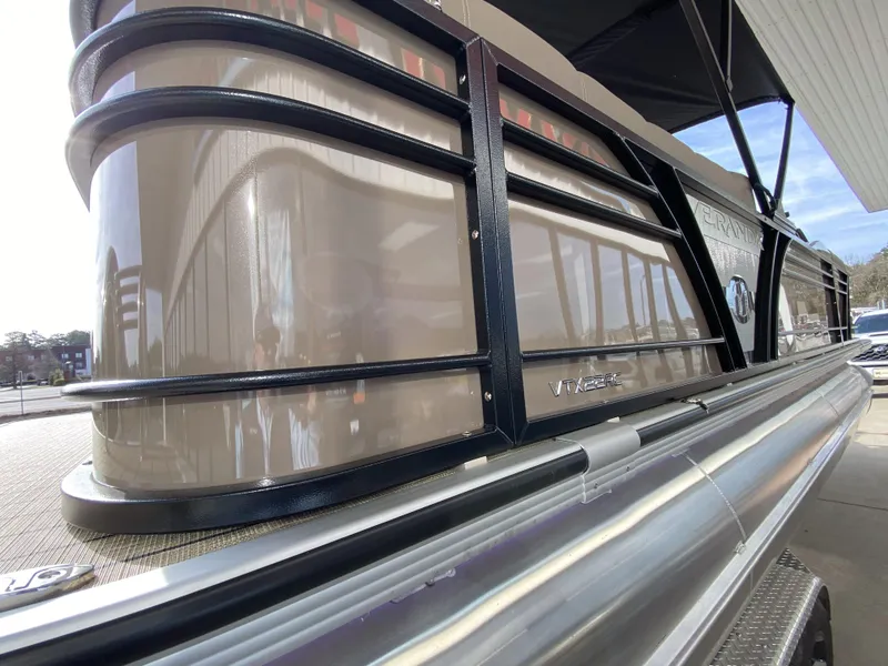 Slide: The Image of 2023 Veranda VTX 22RC pontoon boat side view with sleek design. - 11