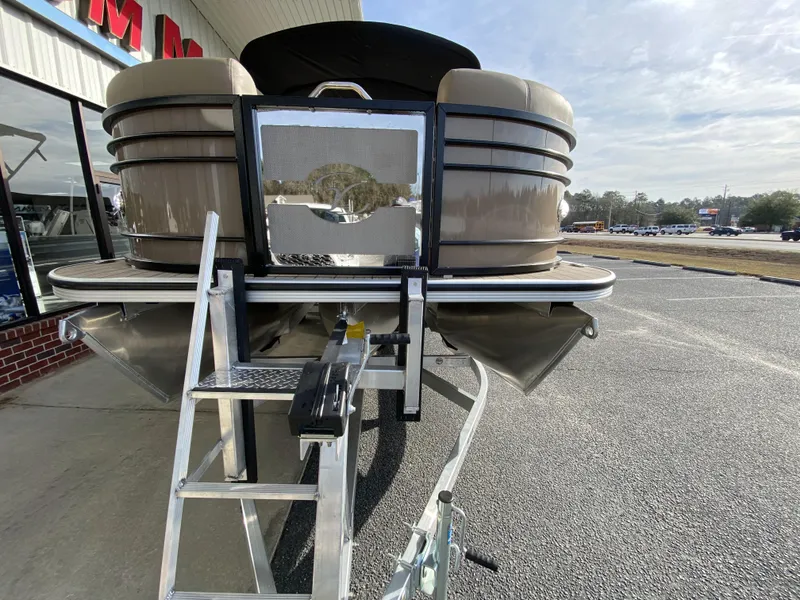 Slide: The Image of 2023 Veranda VTX 22RC pontoon boat with front ladder and trailer. - 5