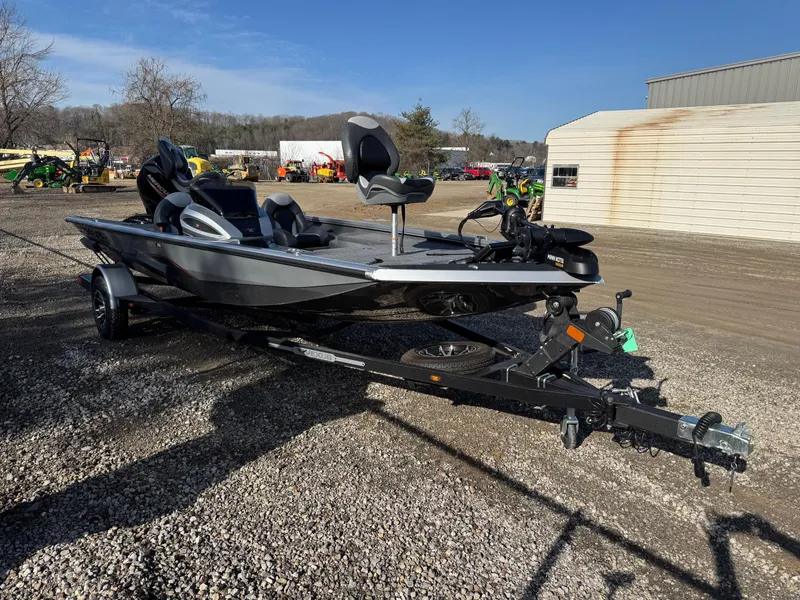 Slide: The Image of 2023 Vexus AVX181 boat on trailer, parked outdoors on gravel. - 1