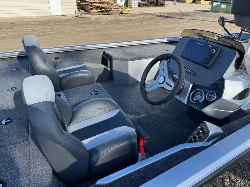 Slide: The Image of 2023 Vexus AVX181 boat interior with steering wheel and seating. - 20