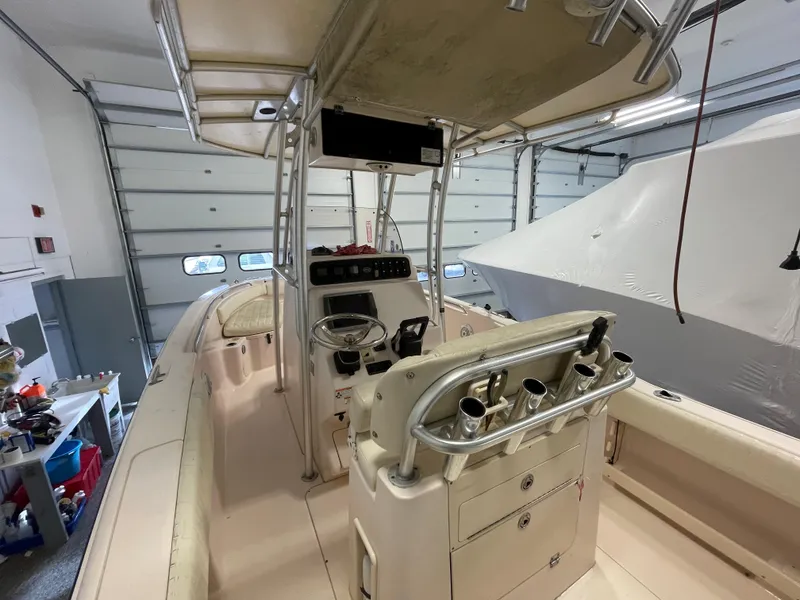 Slide: The Image of 2010 Grady-White 257 Advance boat interior in a garage setting. - 27